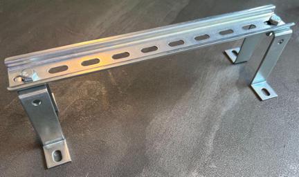 Illustration of a DIN rail with mounting brackets.